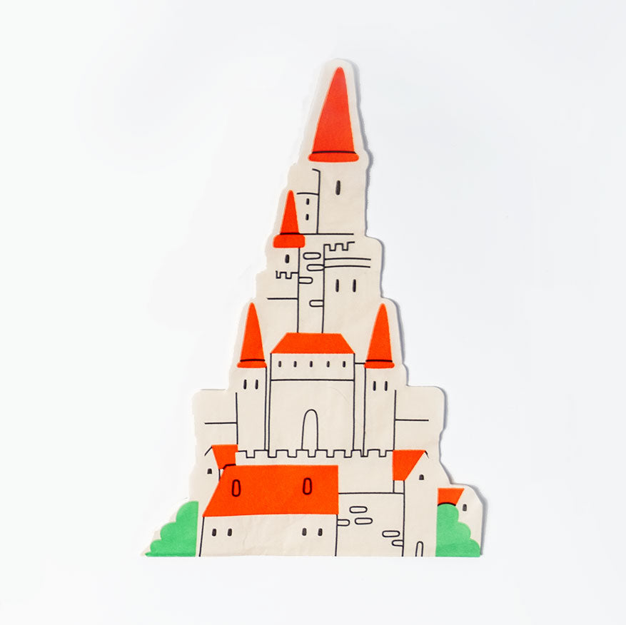 Castle-shaped paper napkin with red roofs and green bushes, part of Princess Mirror Mirror party collection.