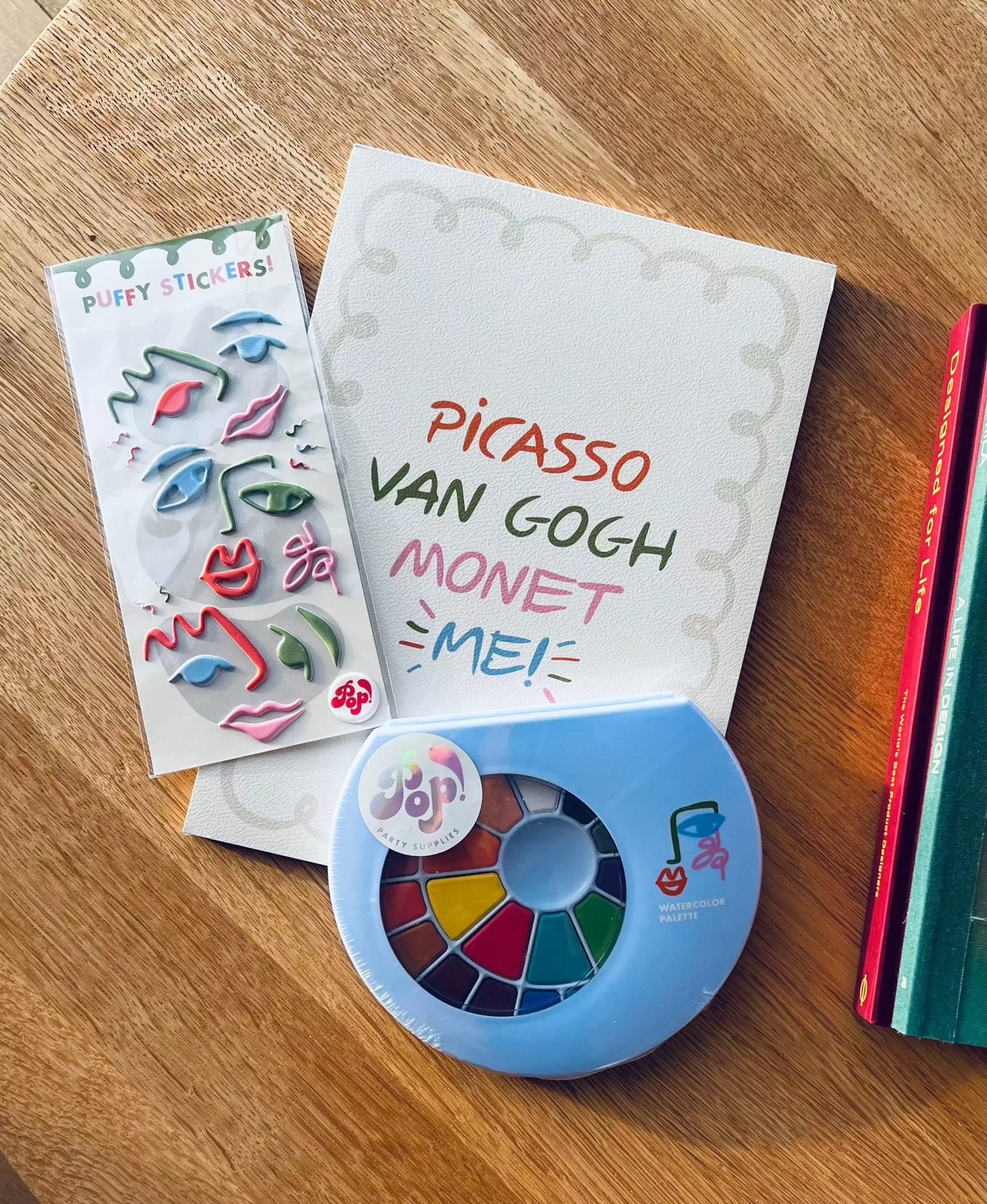 Little Artist Bundle Pack with watercolor palette, paintbrush, art paper pad, and puffy stickers for kids creativity