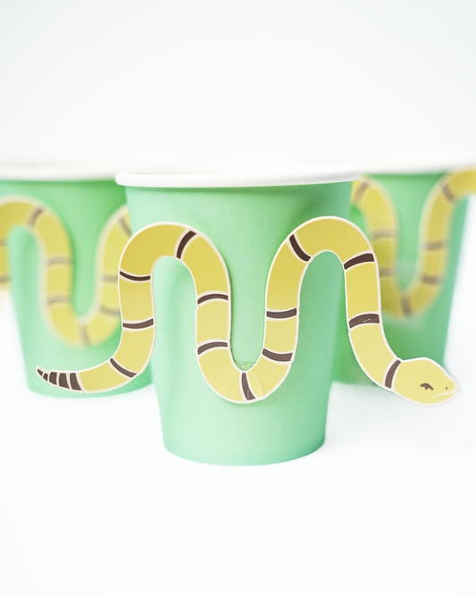 Western party cup with illustrated snake wrap for cowboy birthday theme.