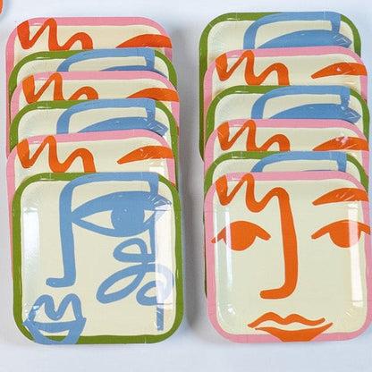 Essential Art Party Pack with modern abstract face design plates, cups, and napkins for 12 guests