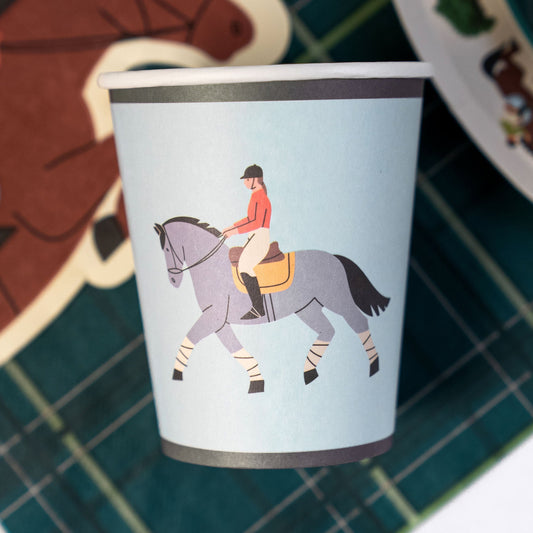 Equestrian horse riding paper cup with rider and horse illustration on sky blue background for kids’ parties and horse events
