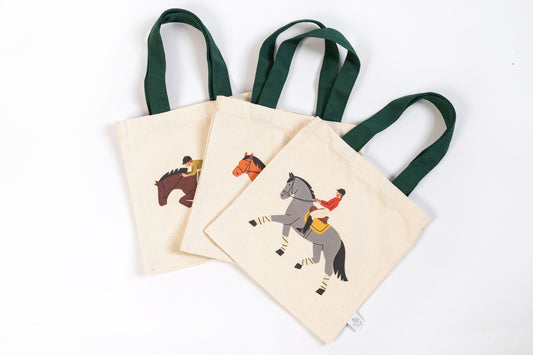 Set of three horse mini tote bags with different equestrian designs and green handles for kids