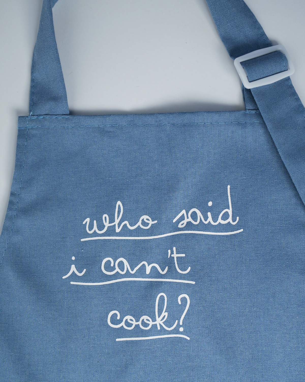 Little Chef Embroidered Linen ApronsGrab our Little Chef Embroidered Linen Aprons and look like a pro in the kitchen! With a white buckle, linen fabric, and a fun embroidered phrase on the front—"Who sPOP party suppliesChef Embroidered Linen cooking apron
